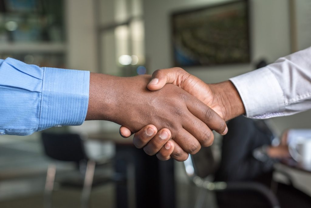 Successful candidate placement confirmed with a handshake